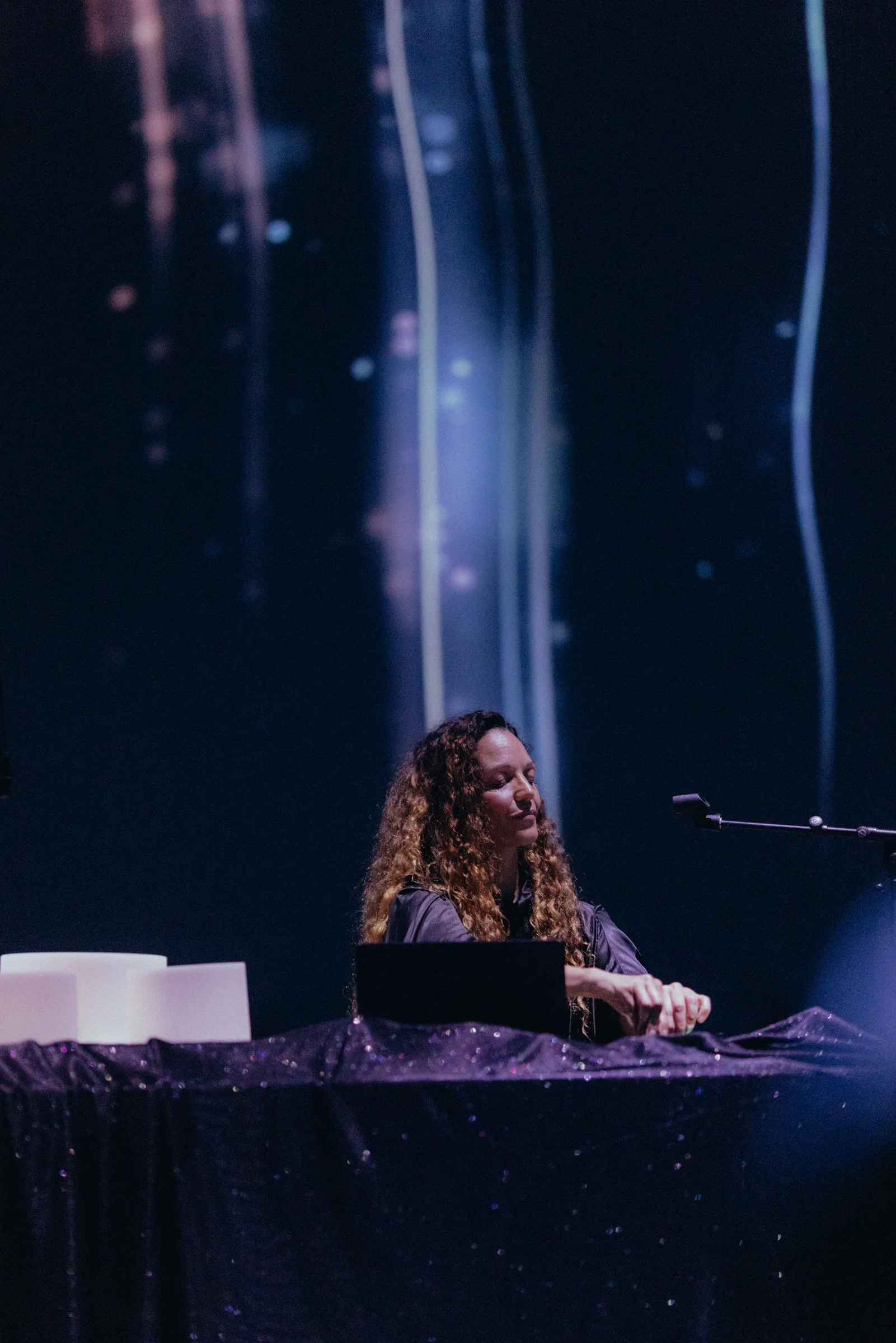 Ilhem at the table during Echoes of Eurydice
