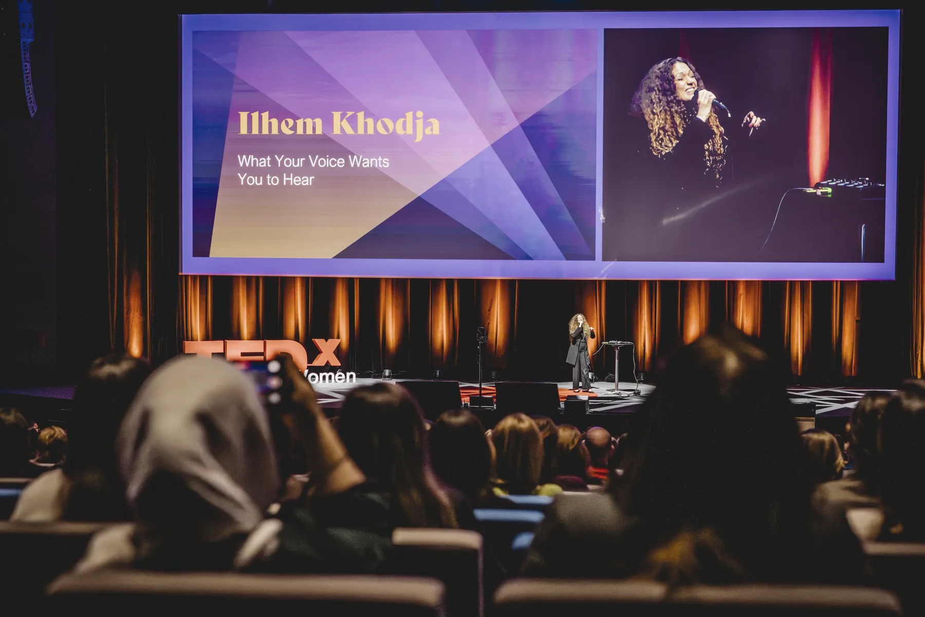 Ilhem performing during her TEDxWomen Lausanne talk